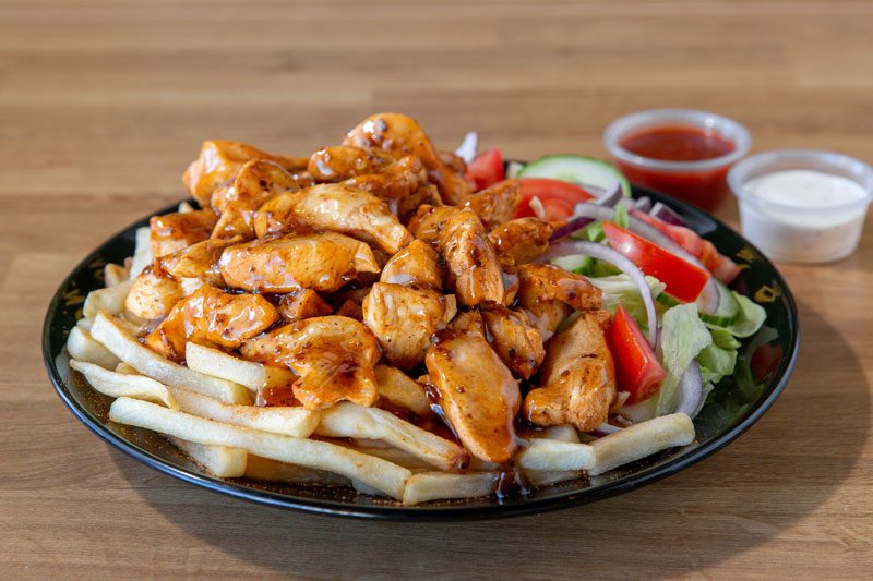 Sweet Chili Chicken Over Fries