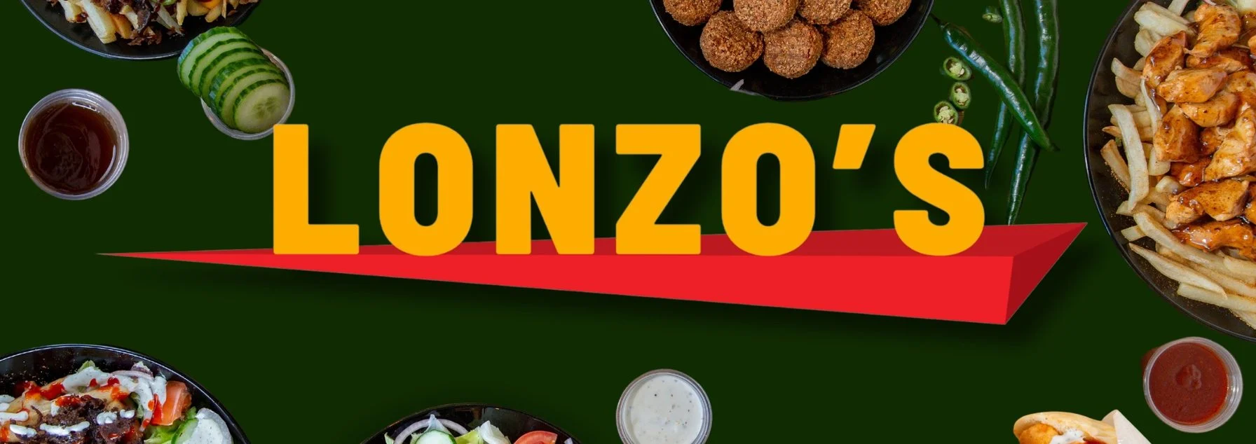 Lonzo’s. Where fast food meets quality food. Platters, falafel, shawarma and fries on a green table.